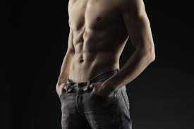 Trim body with firm abs in jeans
